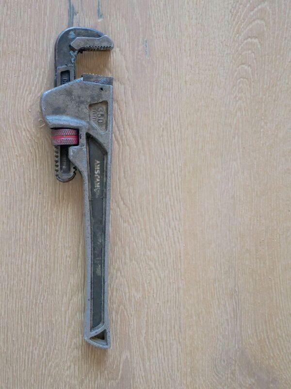 Plumber's wrench and fittings